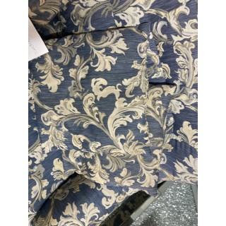 sofa azul de 2 plazas con taburete